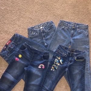5 pairs of jeans!  Girls size 8  and 8 slim.